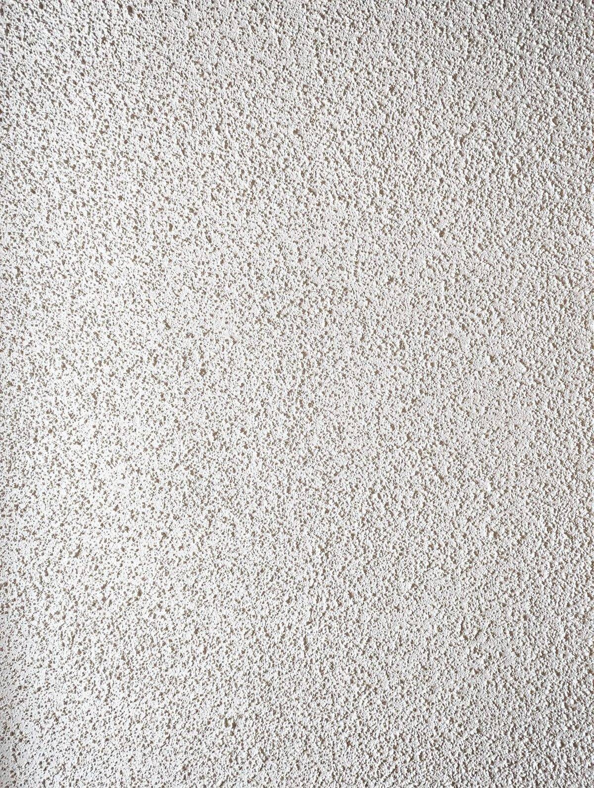 Close-up photo of white popcorn (acoustic) ceiling texture, the rough cottage-cheese finish found in many Homewood homes